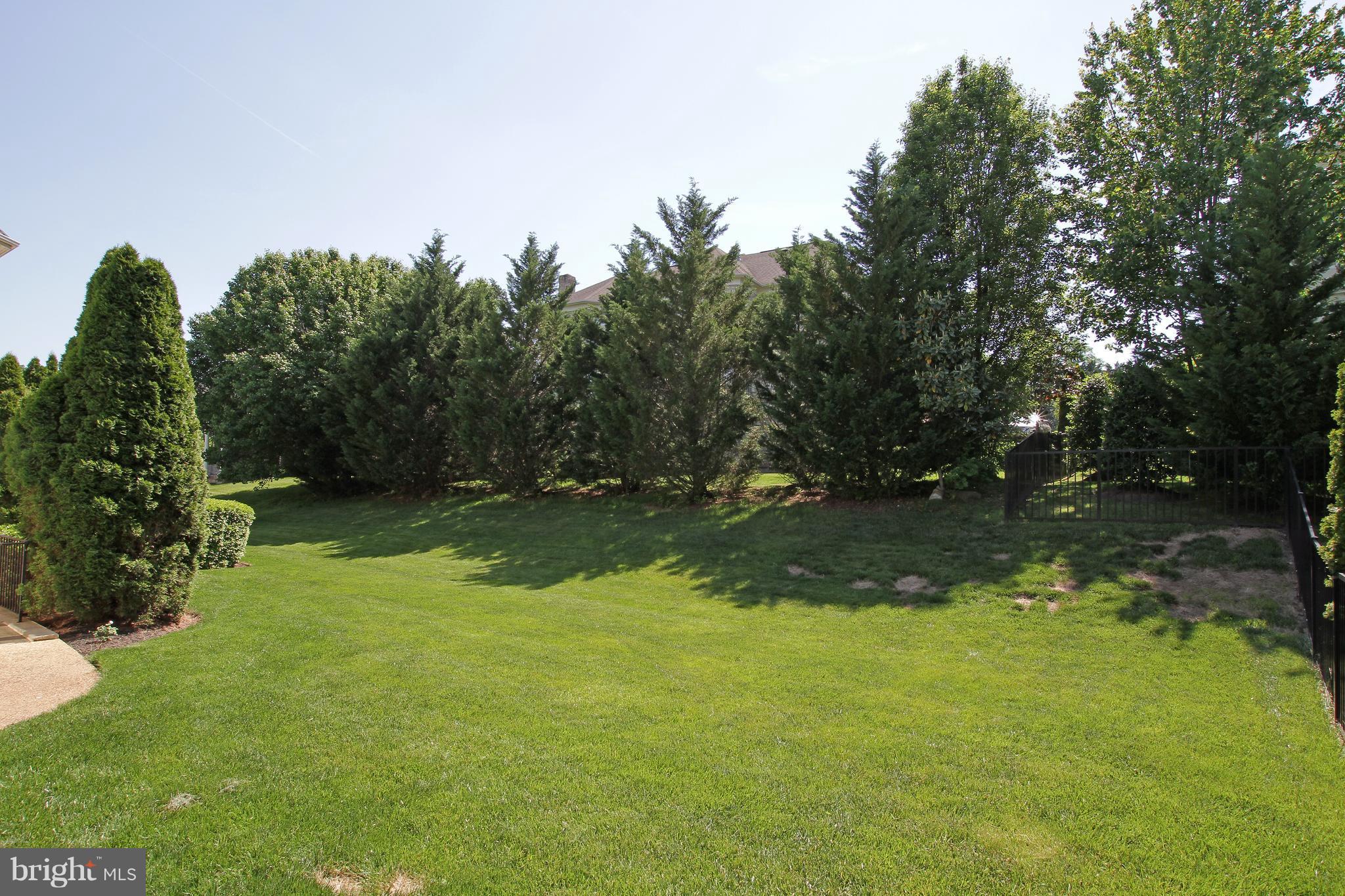 8345 Roxborough Loop Gainesville, VA 20155 - Photo 29 of 30 Rear Yard backing to Tree Line
