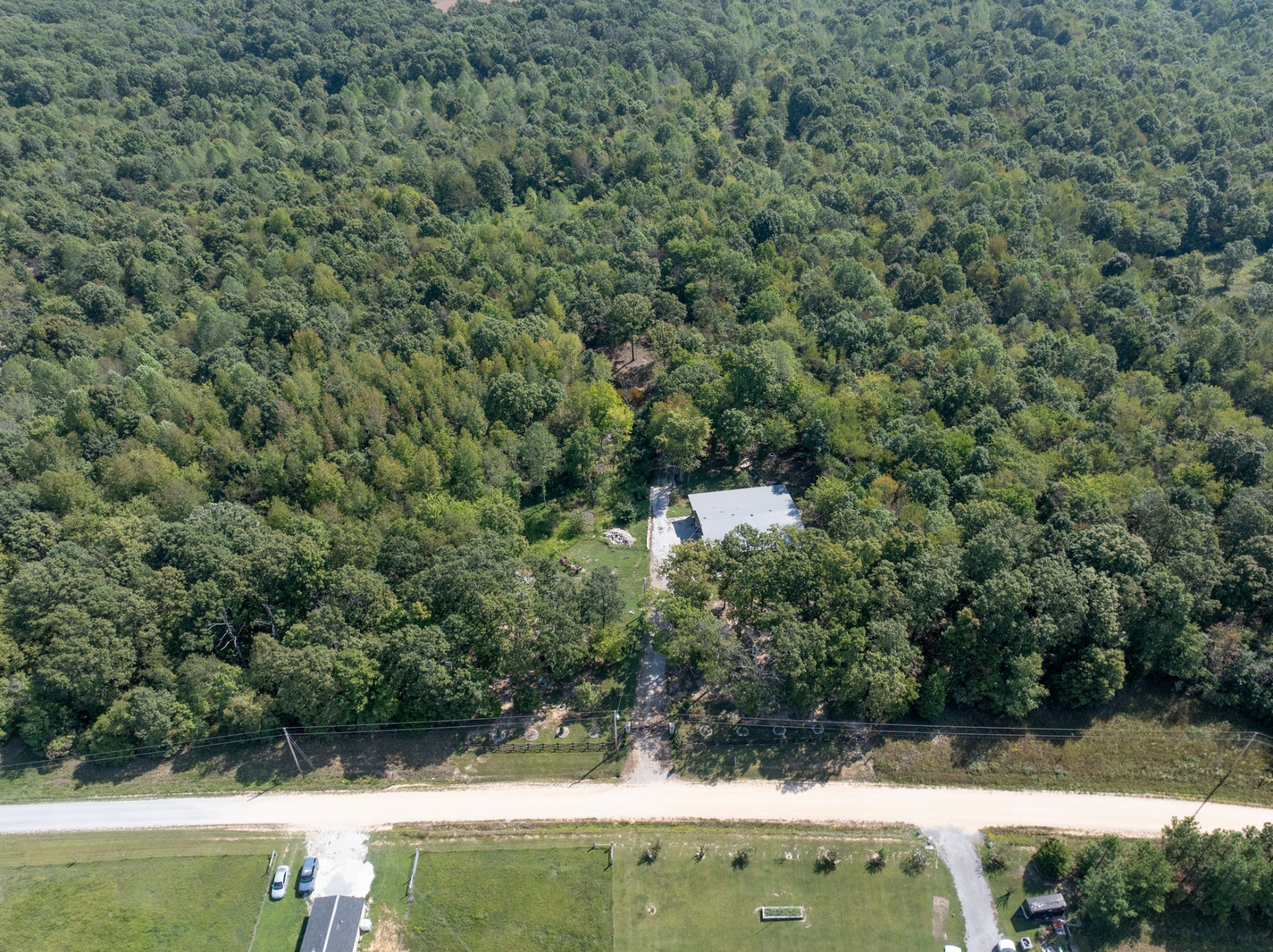 3844 Humphreys County Line Road Dickson, TN 37055 - Photo 38 of 57 an aerial view of residential house with outdoor space