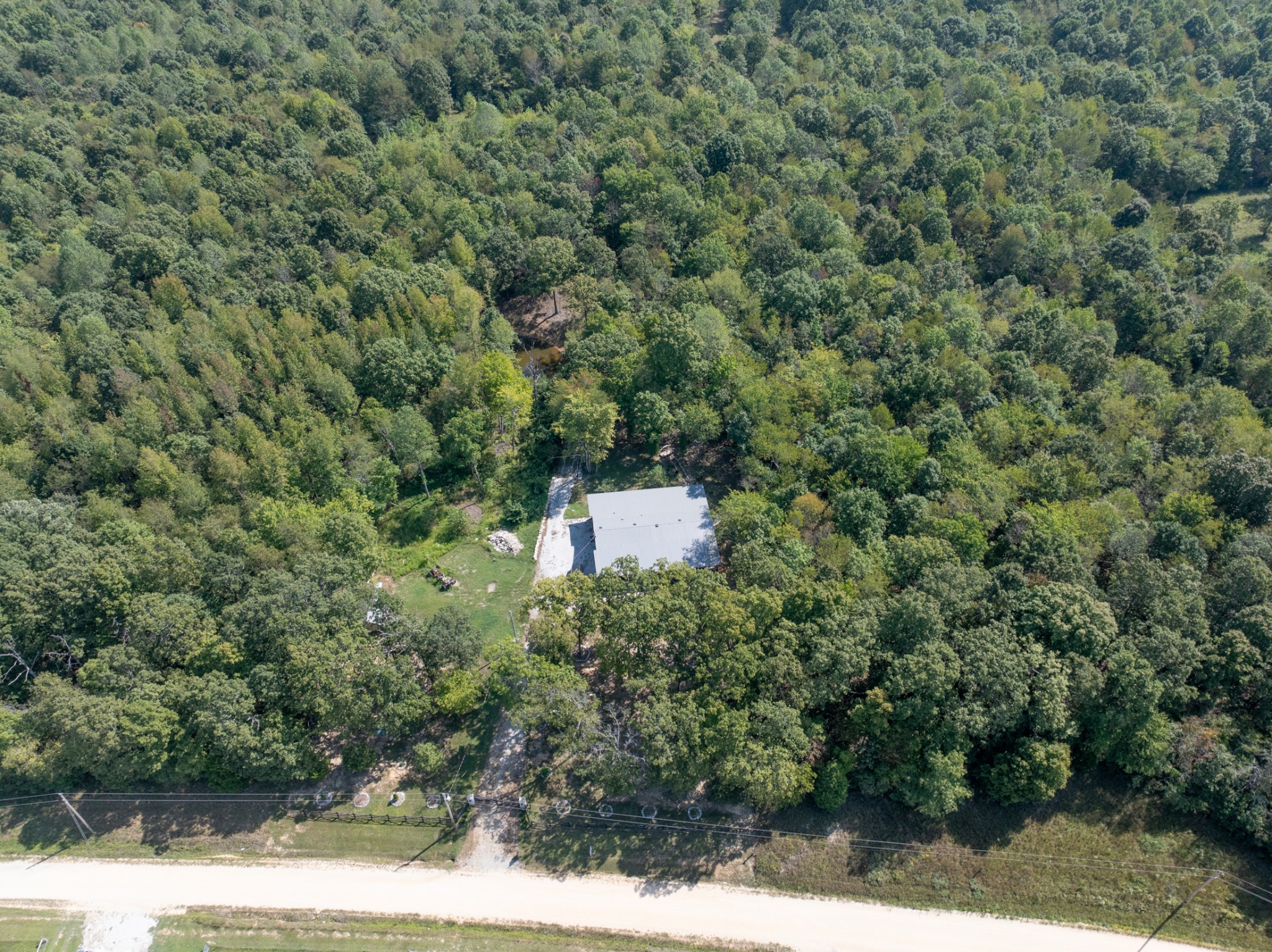 3844 Humphreys County Line Road Dickson, TN 37055 - Photo 39 of 57 an aerial view of a house with a yard