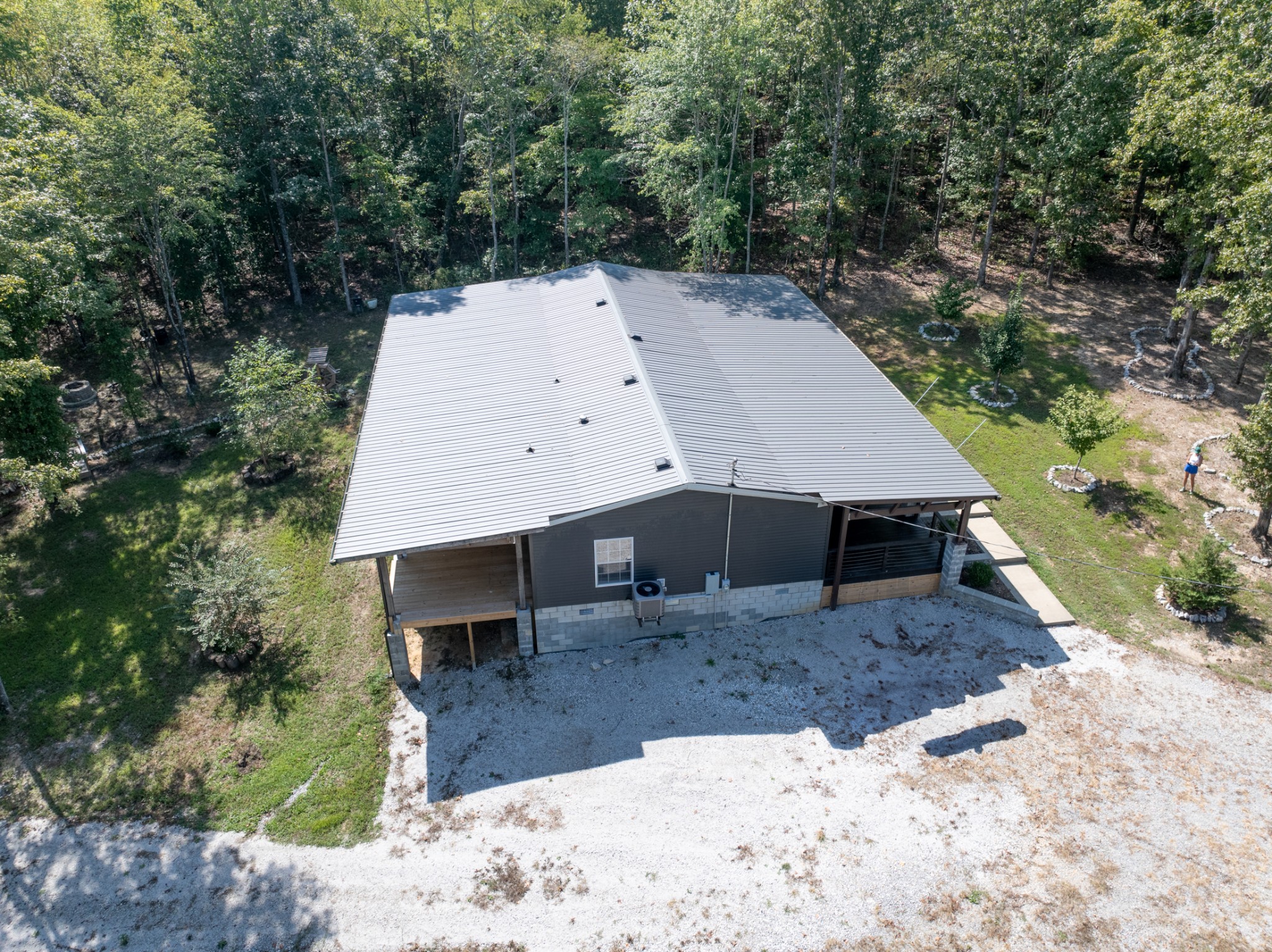 3844 Humphreys County Line Road Dickson, TN 37055 - Photo 46 of 57 an aerial view of a house with a yard patio and backyard