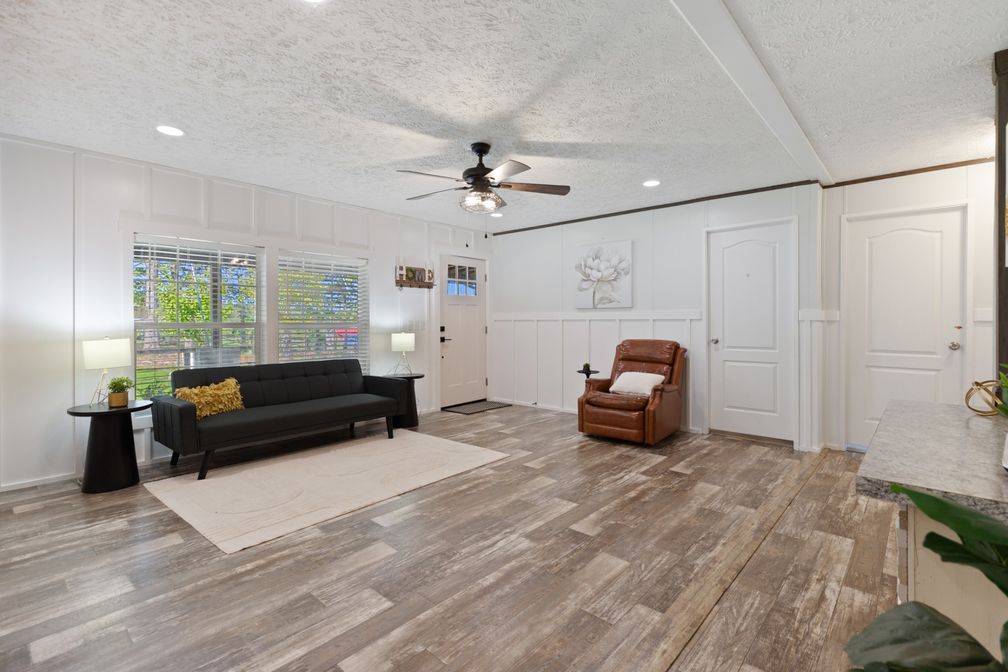 3844 Humphreys County Line Road Dickson, TN 37055 - Photo 10 of 57 a living room with furniture and a chandelier