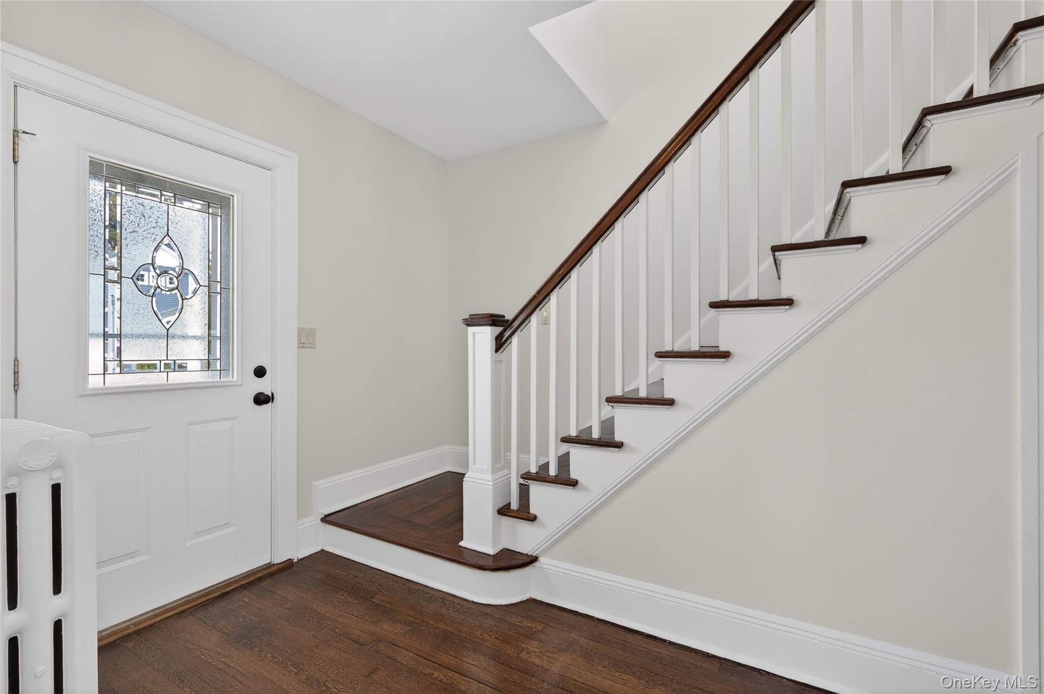 26 West 5th Street Locust Valley, NY 11560 - Photo 2 of 36 a view of entryway with wooden floor