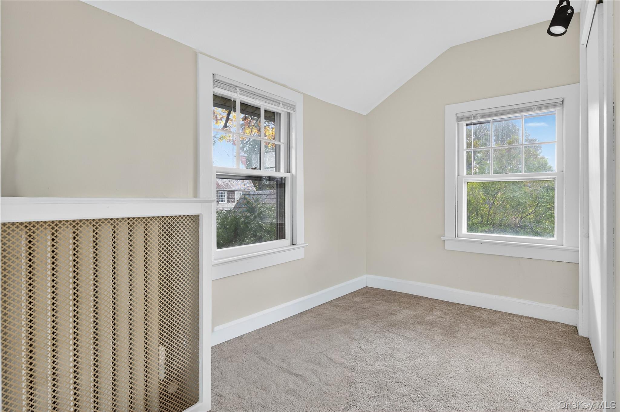 26 West 5th Street Locust Valley, NY 11560 - Photo 32 of 36 an empty room with windows