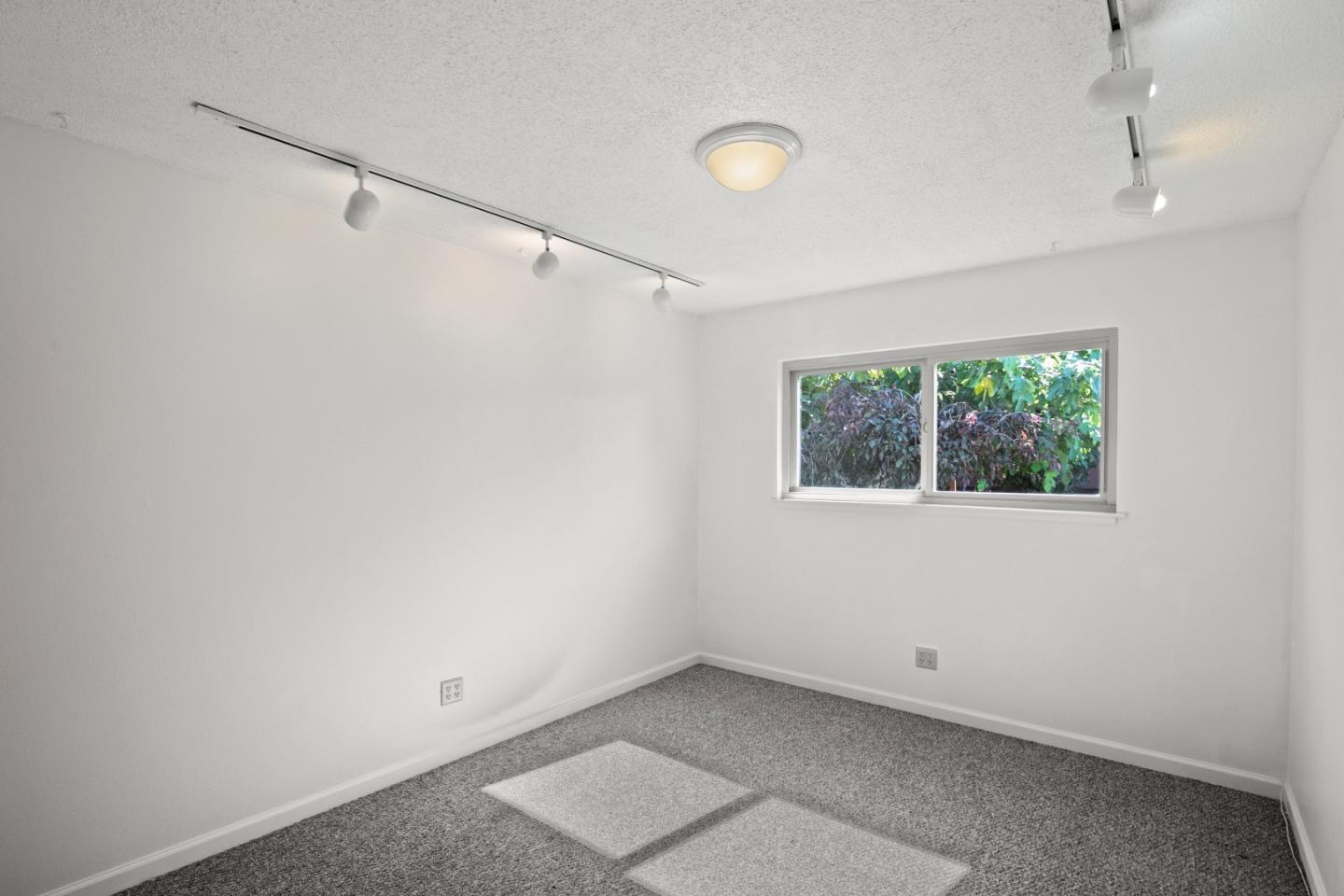 502 Ridgeview Avenue Marina, CA 93933 - Photo 12 of 20 an empty room with a window