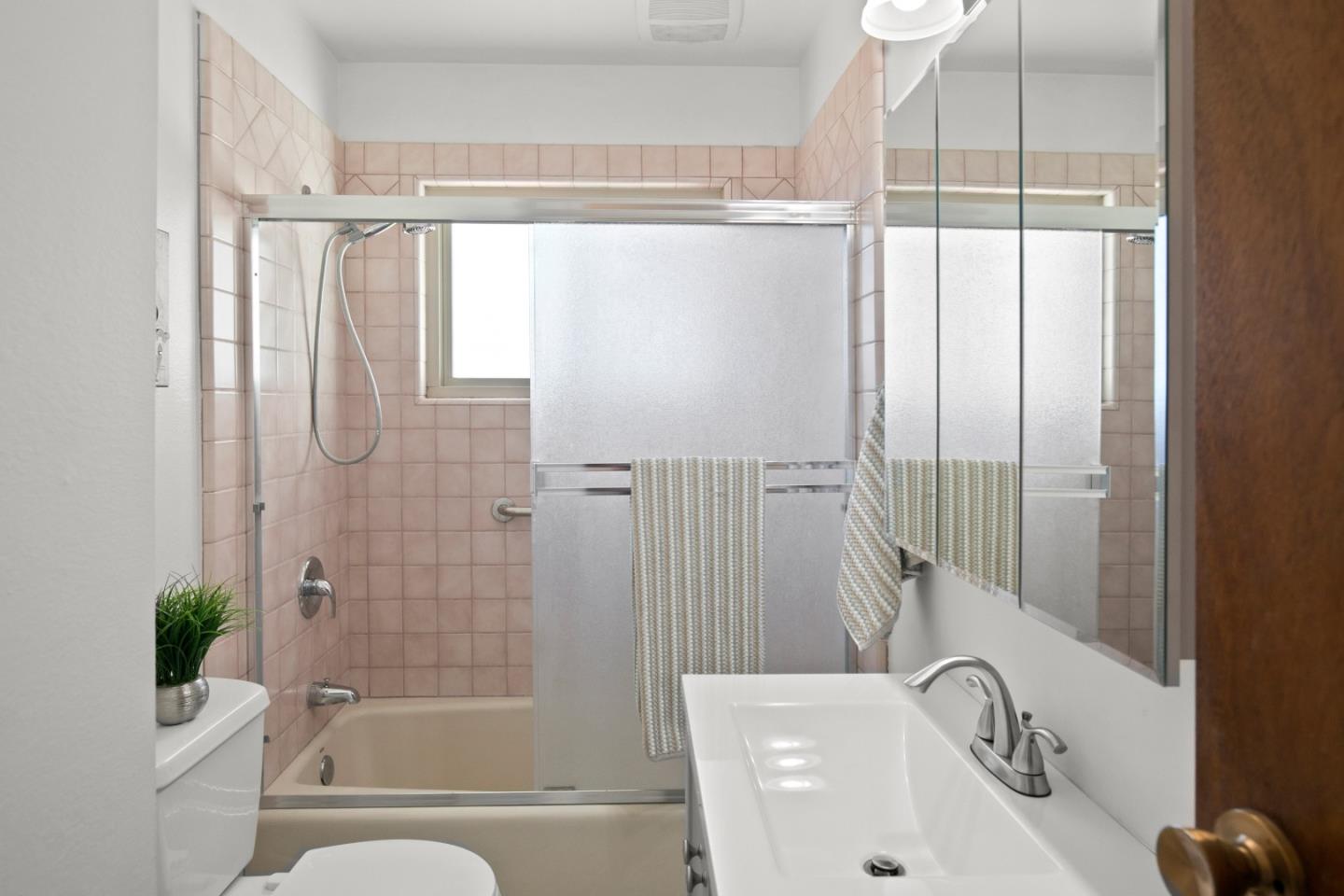 502 Ridgeview Avenue Marina, CA 93933 - Photo 14 of 20 a bathroom with a bathtub and a shower