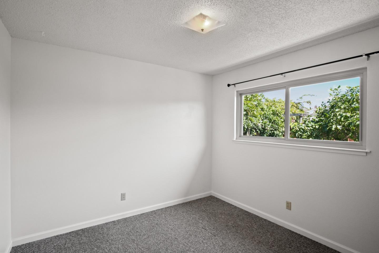 502 Ridgeview Avenue Marina, CA 93933 - Photo 16 of 20 an empty room with a window