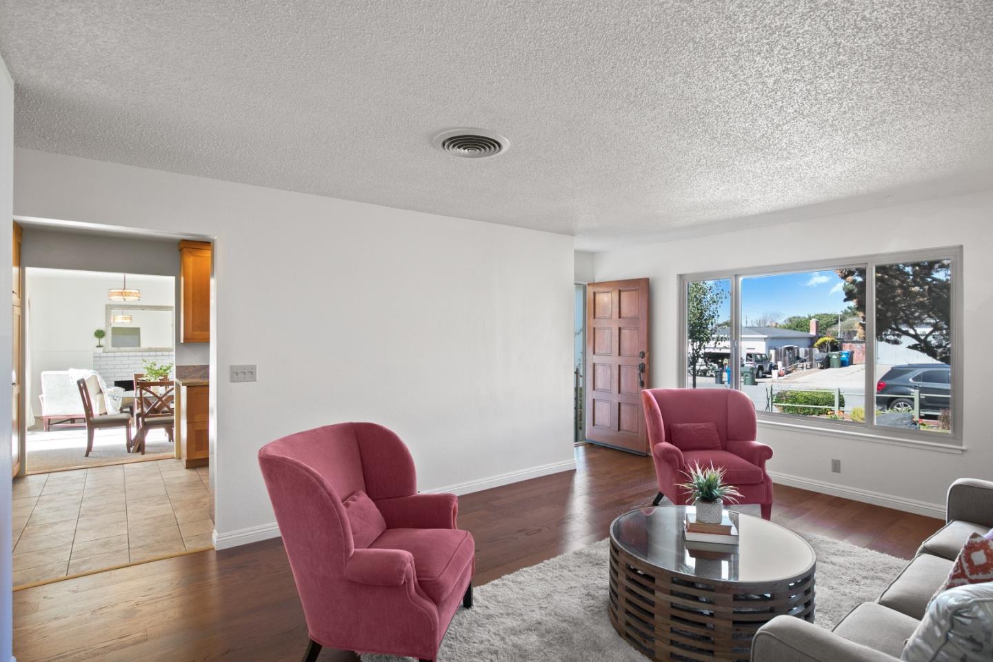 502 Ridgeview Avenue Marina, CA 93933 - Photo 3 of 20 a living room with furniture and a large window