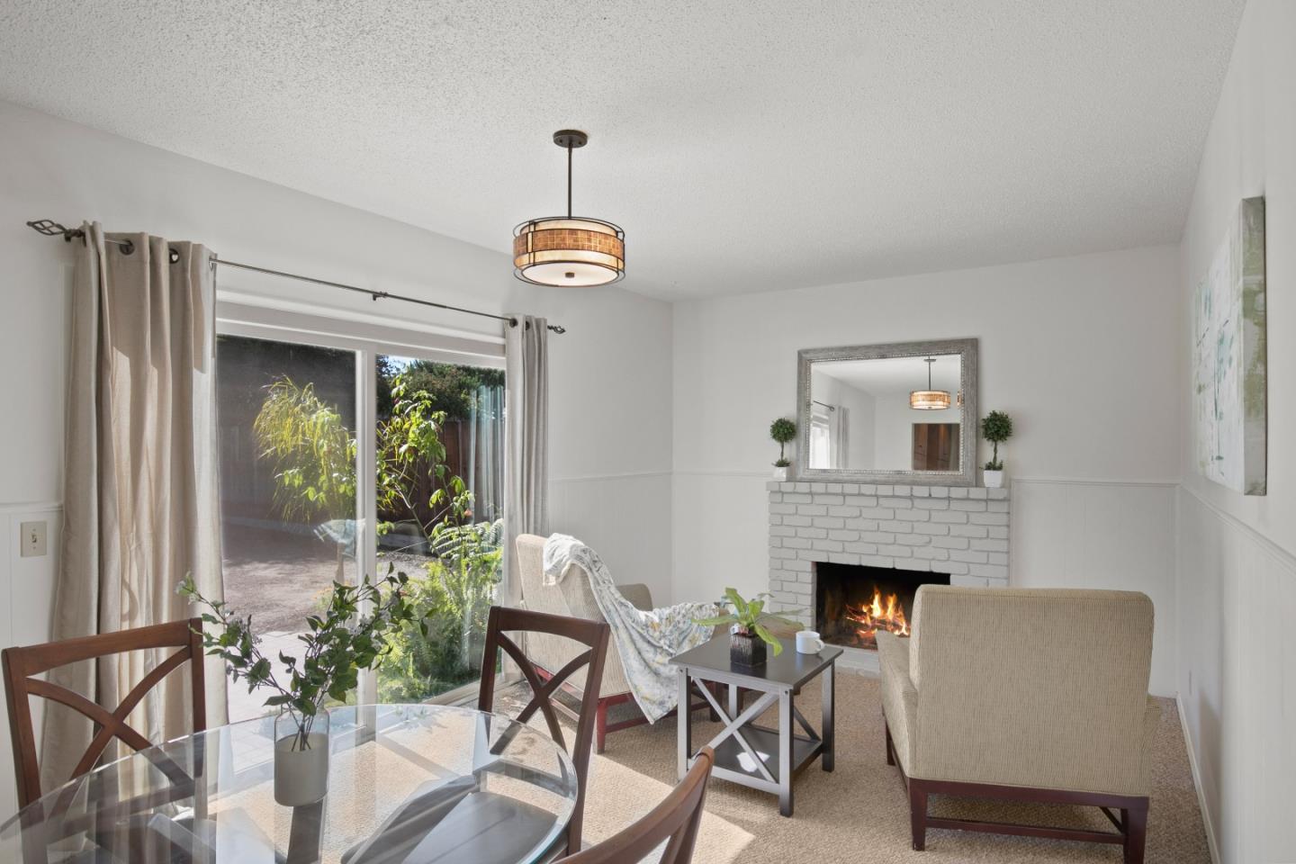 502 Ridgeview Avenue Marina, CA 93933 - Photo 8 of 20 a living room with furniture and a fireplace