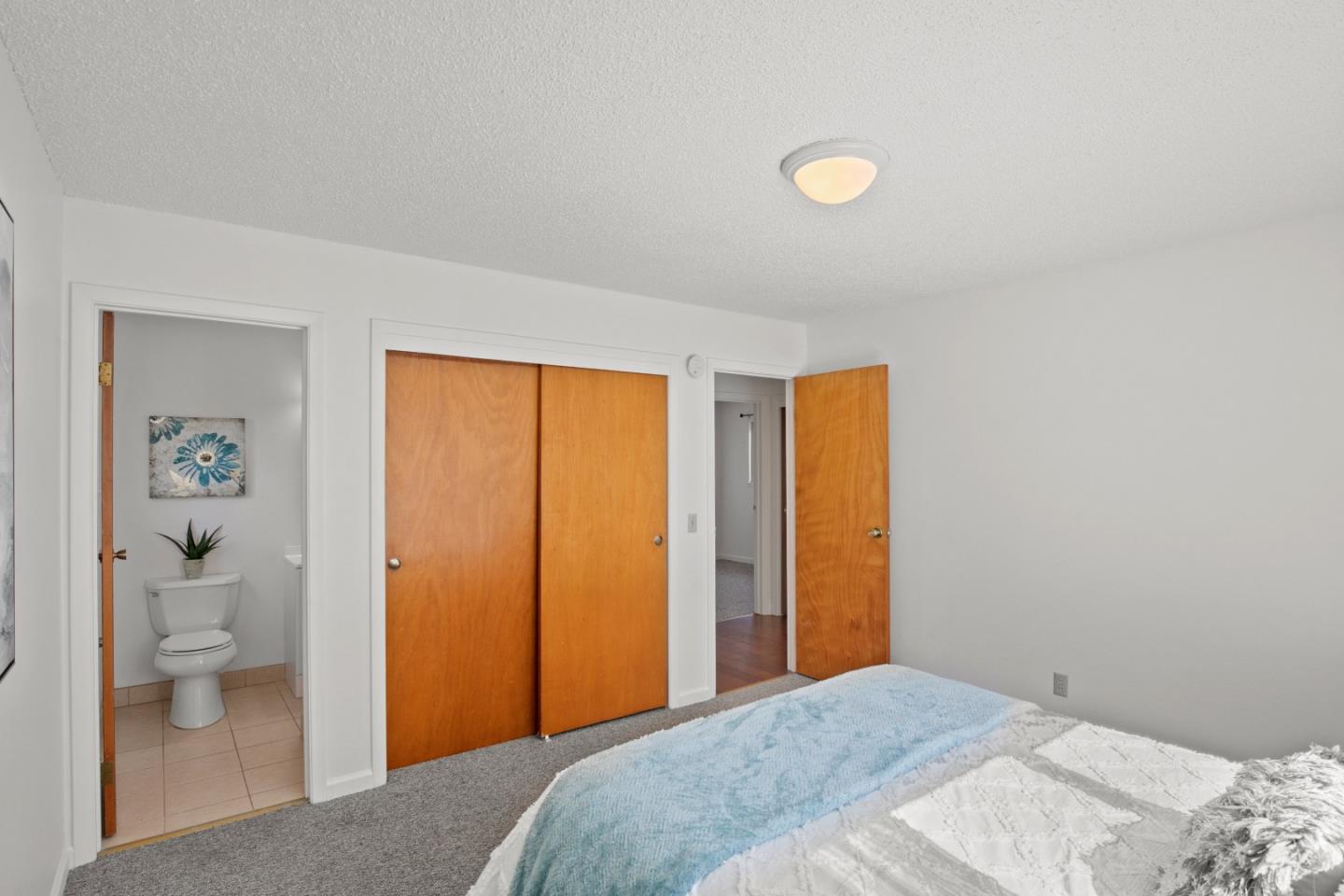 502 Ridgeview Avenue Marina, CA 93933 - Photo 10 of 20 a bedroom with a bed and a bathroom