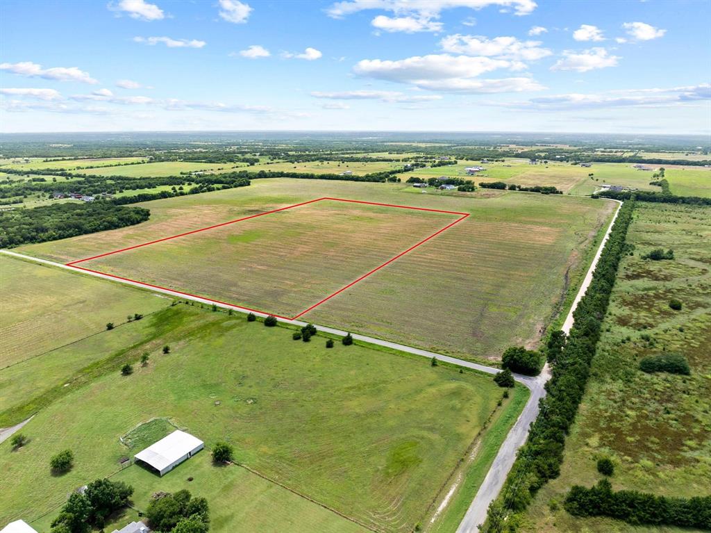 26.1-acres Bucksnort Road Van Alstyne, TX 75495 - Photo 3 of 3 a view of an outdoor space and a lake view