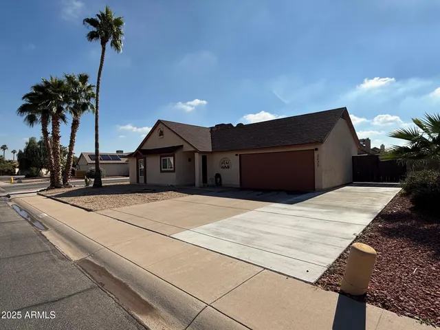 a house with view of palm trees