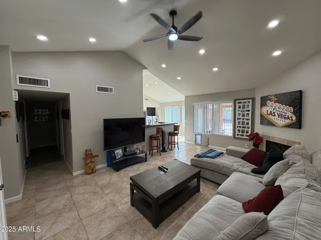 a kitchen with granite countertop stainless steel appliances and wooden cabinets