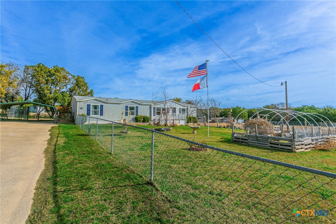 2811 Mimosa Drive Kempner, TX 76539 - Photo 20 of 27 a house with swimming pool in front of it