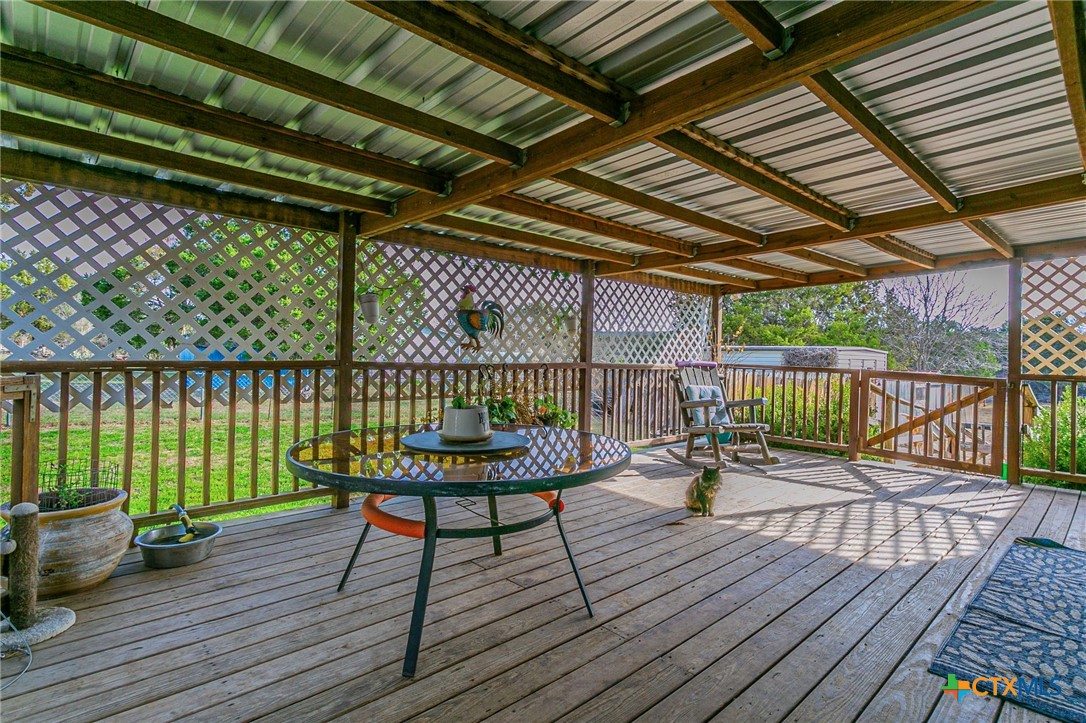 2811 Mimosa Drive Kempner, TX 76539 - Photo 21 of 27 a balcony with wooden floor and outdoor seating