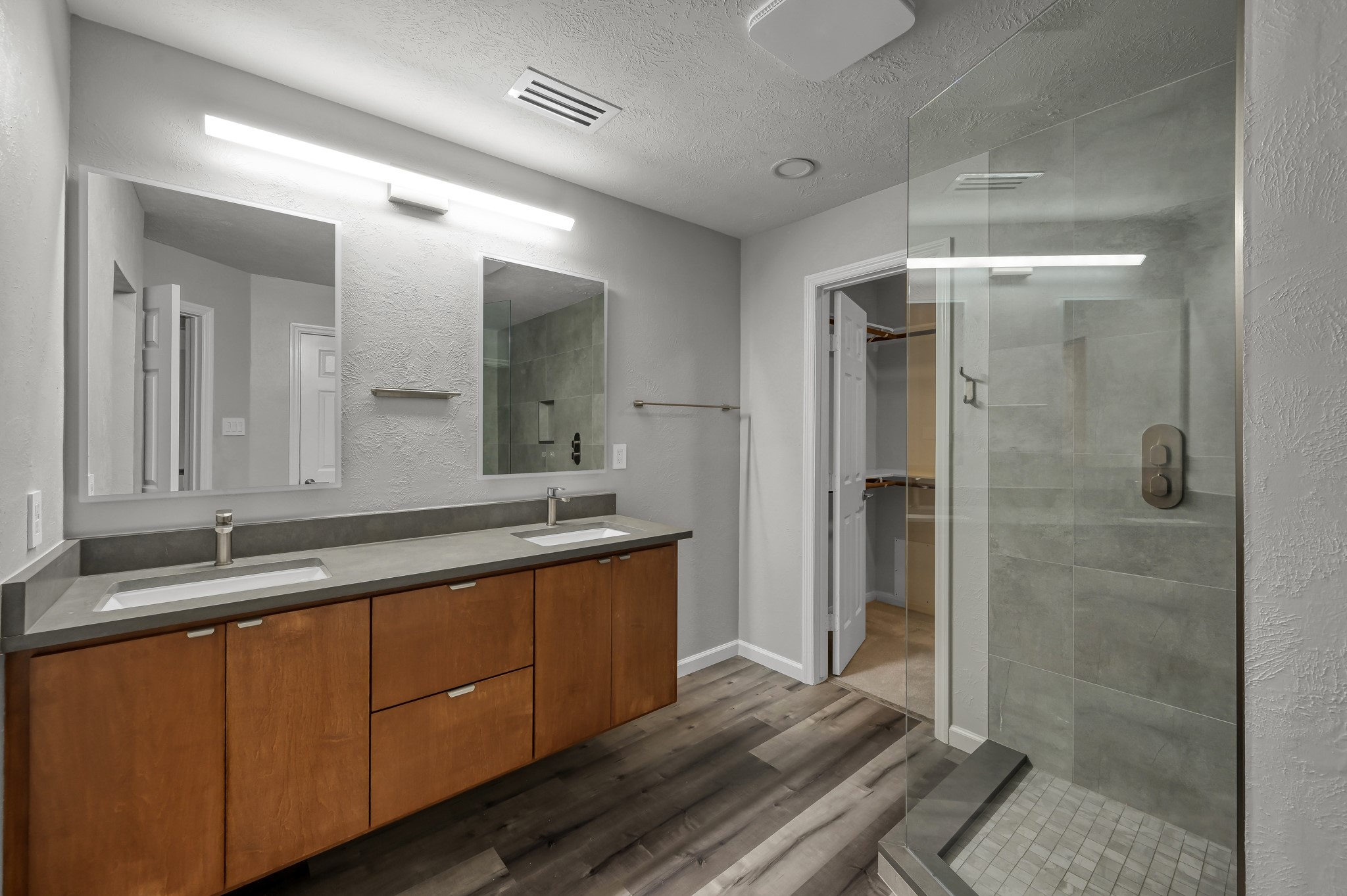 23 Alderon Woods Place Spring, TX 77382 - Photo 18 of 25 a bathroom with a double vanity sink mirror and shower