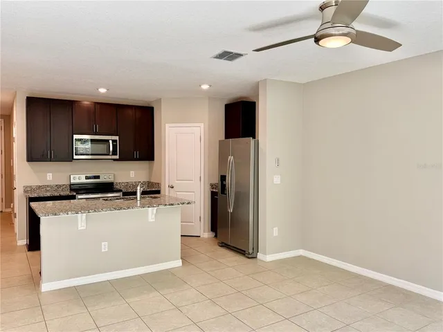 a view of a back yard from a room