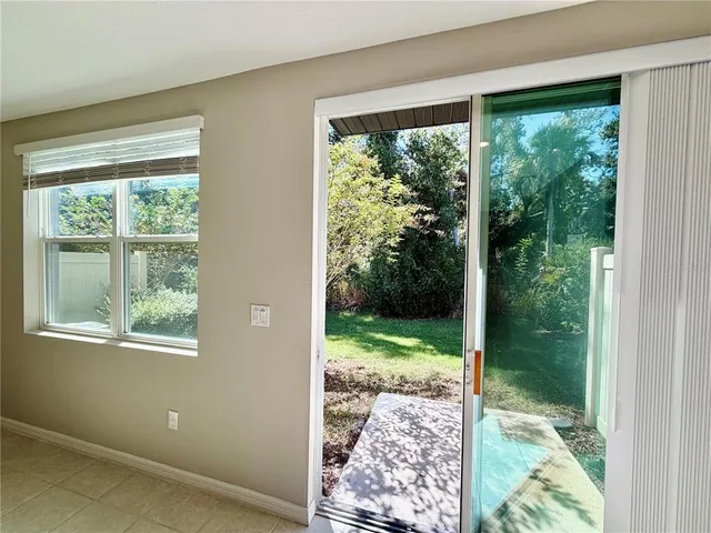 a large kitchen with a stove and a sink