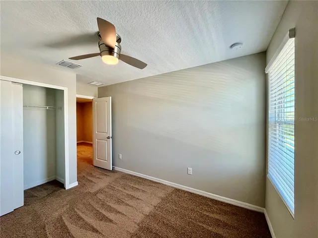 a view of a lake with a big yard