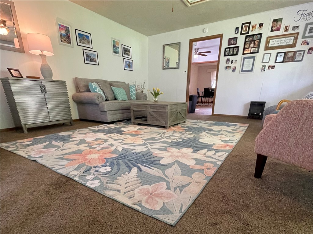 360 Ridge Street Piqua, OH 45356 - Photo 30 of 46 This inviting living room features a warm color palette and comfortable flooring for relaxation.