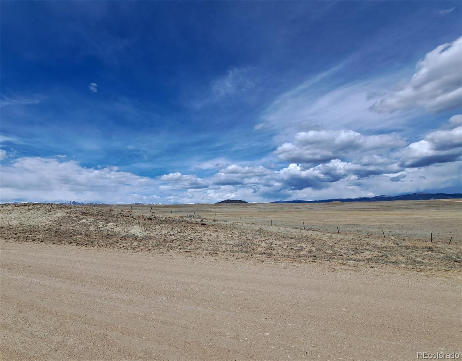 305 Badger Road Como, CO 80432 - Photo 15 of 33 a view of a lake view with a beach