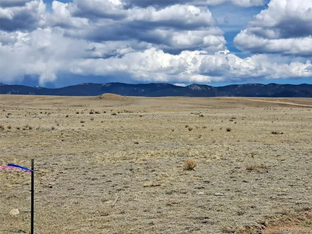 a view of ocean and mountain
