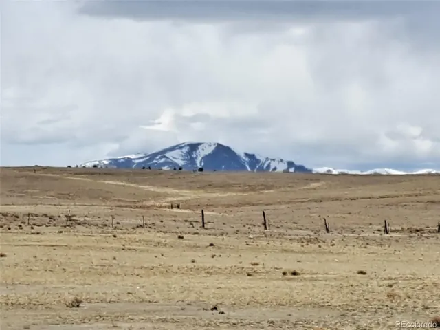 a view of ocean and mountain