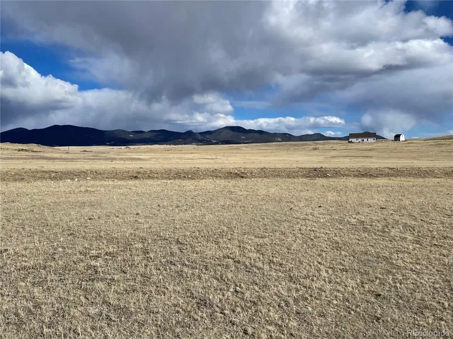 a view of an ocean and mountain