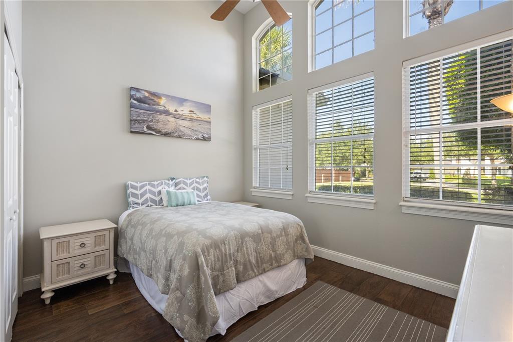 2002 Water Key Drive Windermere, FL 34786 - Photo 26 of 60 a bedroom with a bed and a window