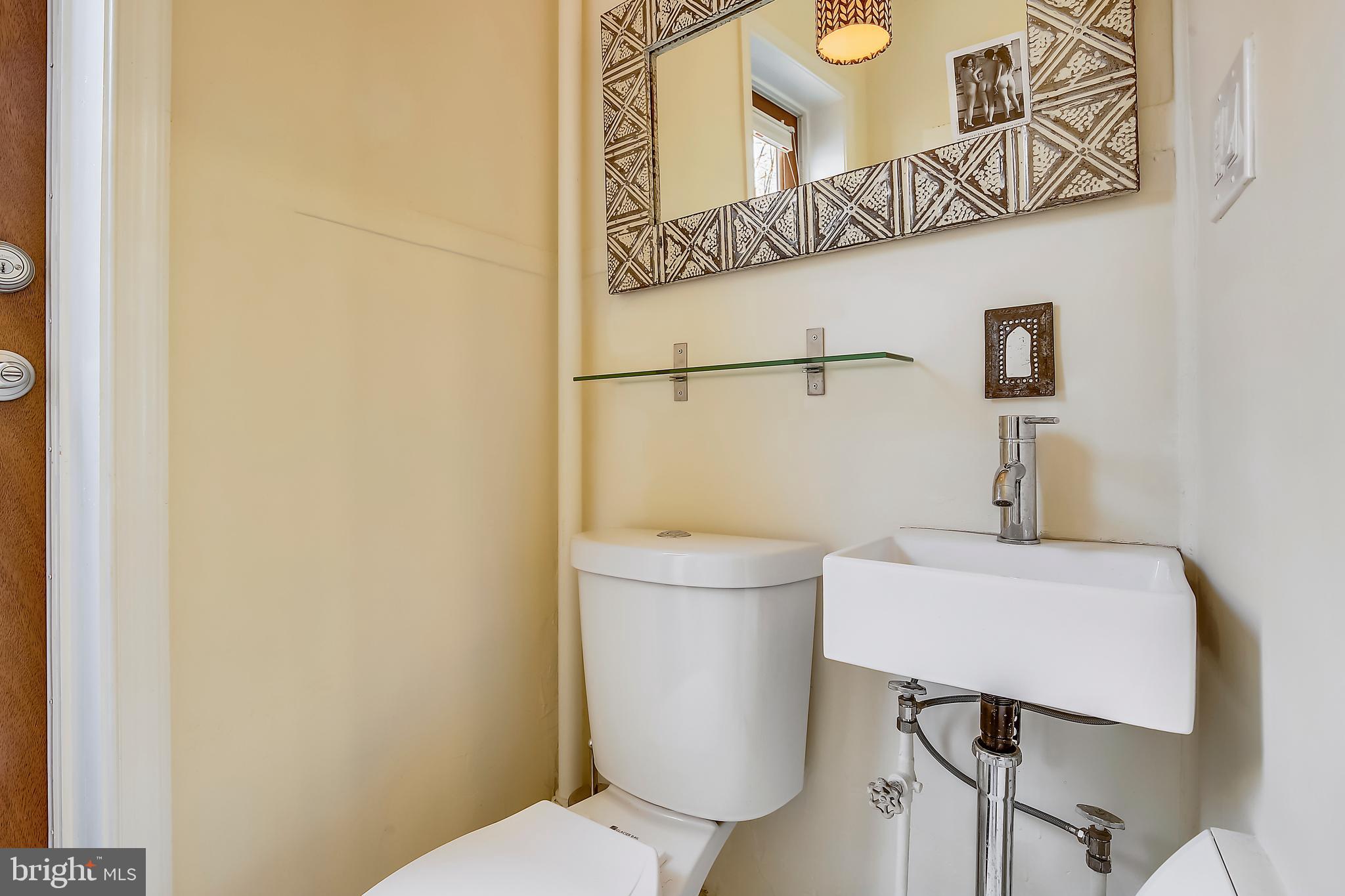 640 G Street Southeast Washington, DC 20003 - Photo 24 of 58 Half bath downstairs with outside access