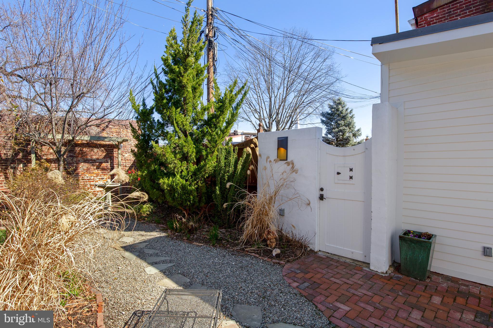 640 G Street Southeast Washington, DC 20003 - Photo 40 of 58 rear view showing ally access gate
