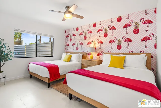 a bathroom with a double vanity sink toilet and shower