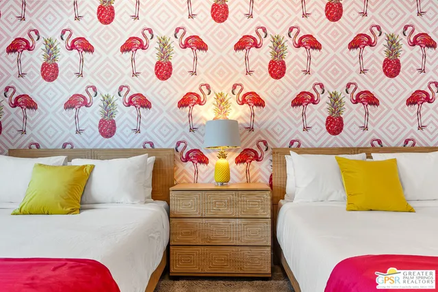 a bathroom with a granite countertop shower a toilet and a sink