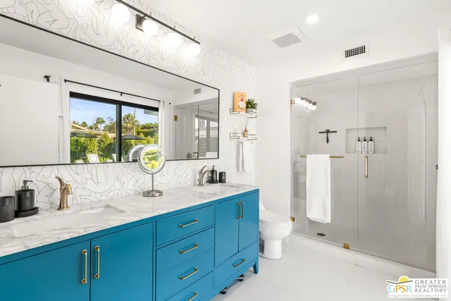 a view of an outdoor dining space with a table or chairs
