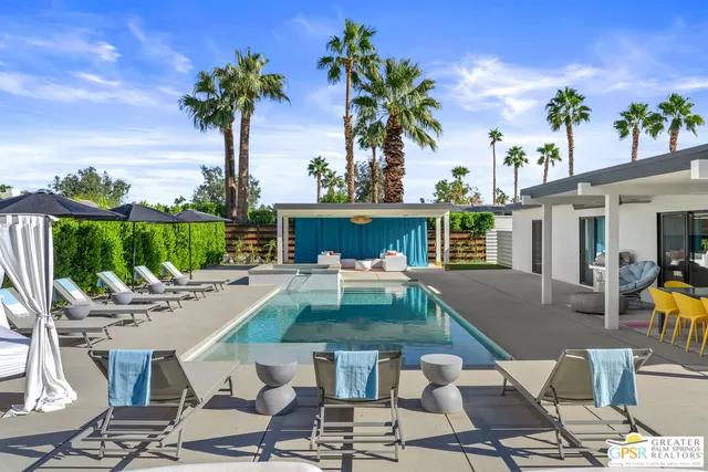 a outdoor living space with furniture and a potted plant