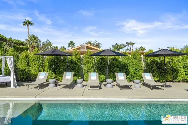 a view of a house with swimming pool