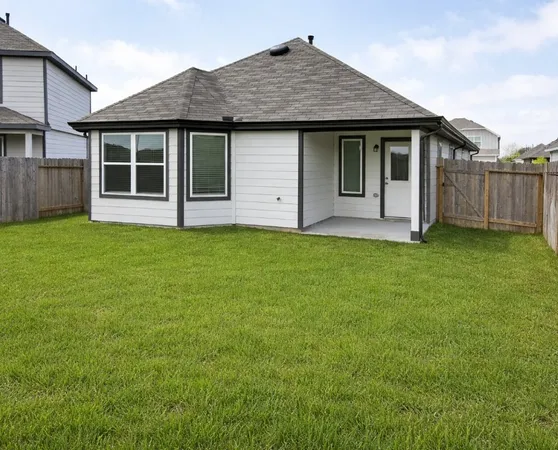 a view of front of a house with a yard