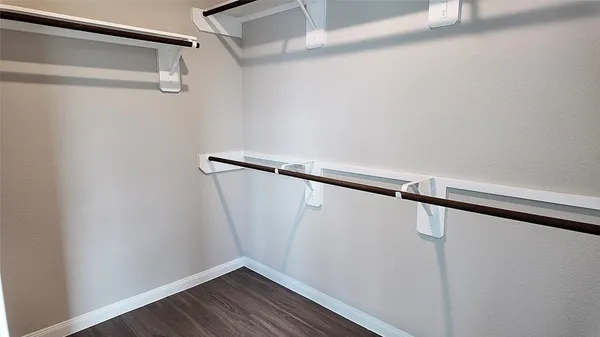 a view of a room with racks on the wall