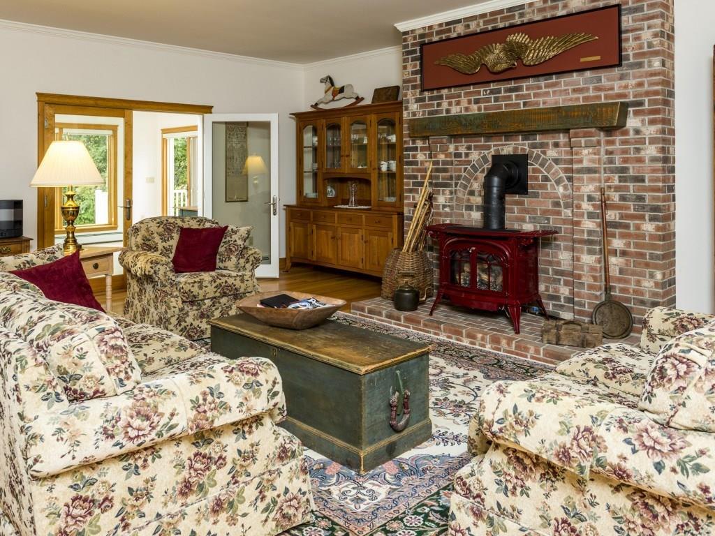 43 Pasture Lane Boothbay, ME 04571 - Photo 11 of 35 The living room with brick fireplace...
