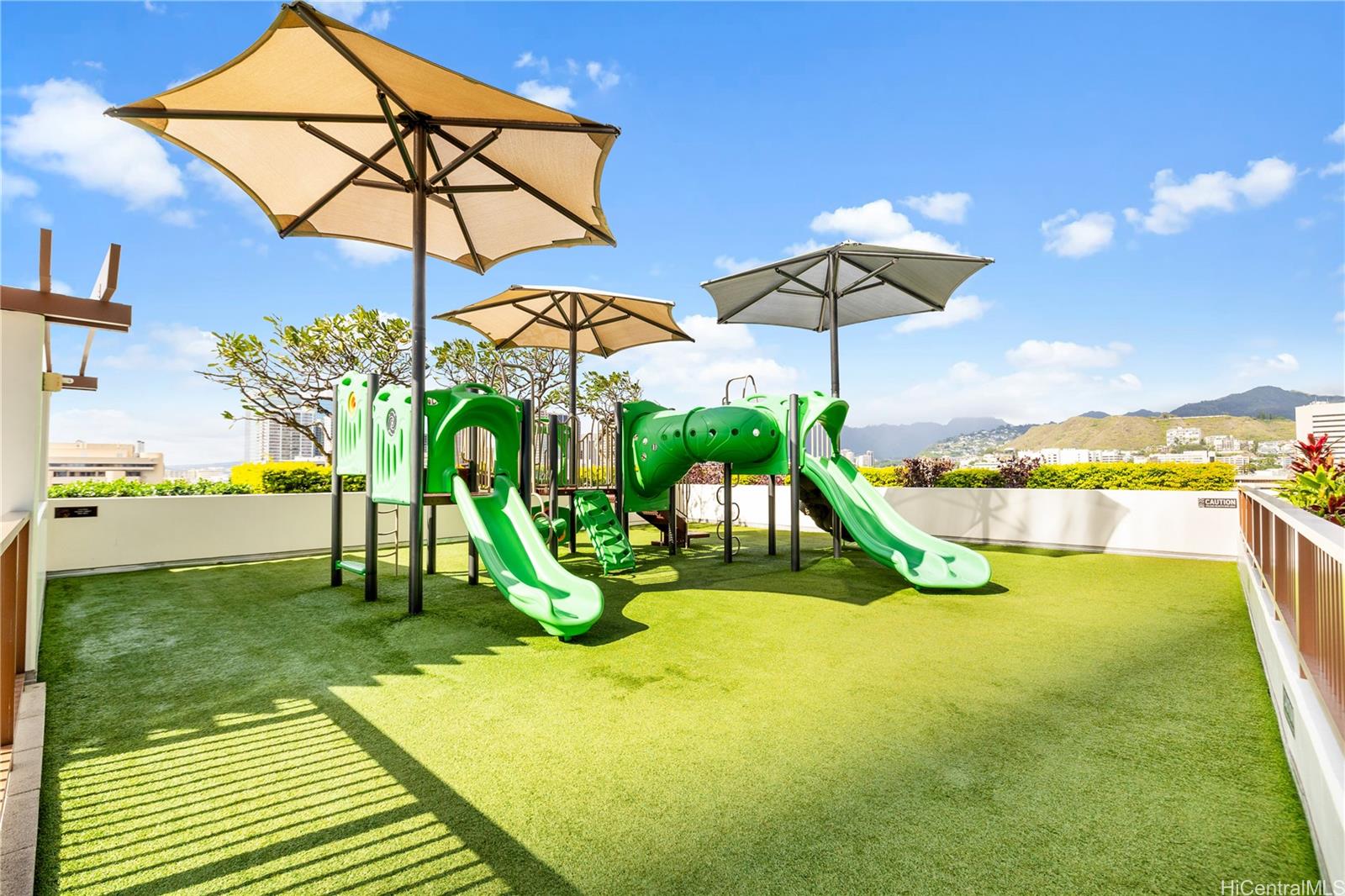 555 South Street, Unit 1805 Honolulu, HI 96813 - Photo 11 of 20 a view of a swimming pool with a patio and a yard