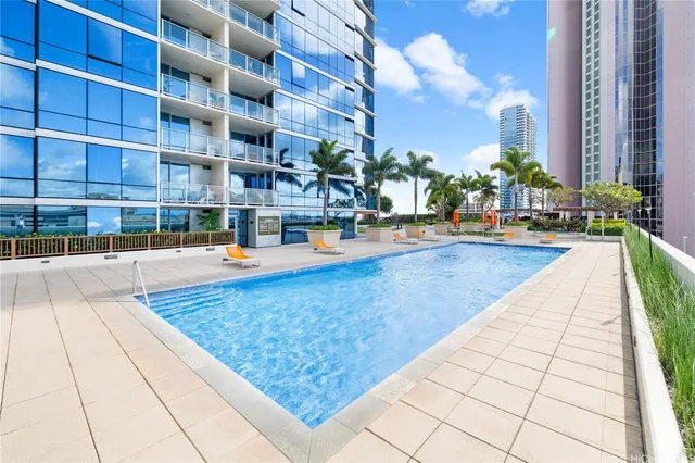 a view of building with swimming pool