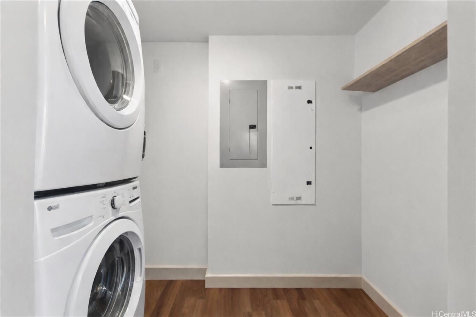 555 South Street, Unit 1805 Honolulu, HI 96813 - Photo 7 of 20 a view of a storage and utility room with washer and dryer