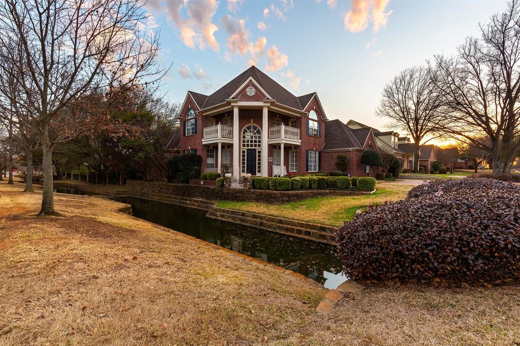 2405 Danbury Drive Colleyville, TX 76034 - Photo 1 of 1 a view of a house with a yard and large trees