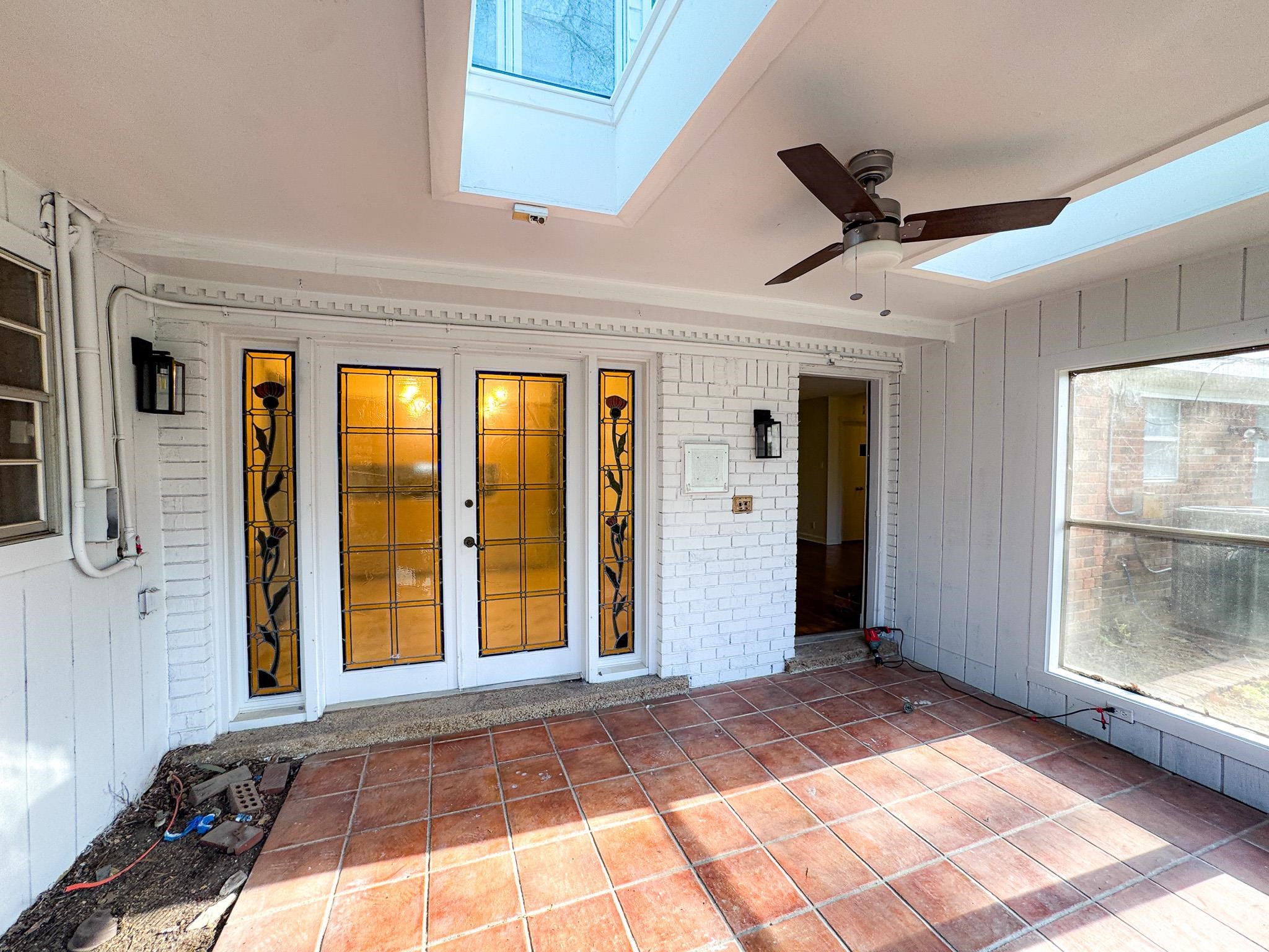 1345 Hickory Ridge Cove Memphis, TN 38116 - Photo 24 of 29 a view of a hallway with wooden floor and a window