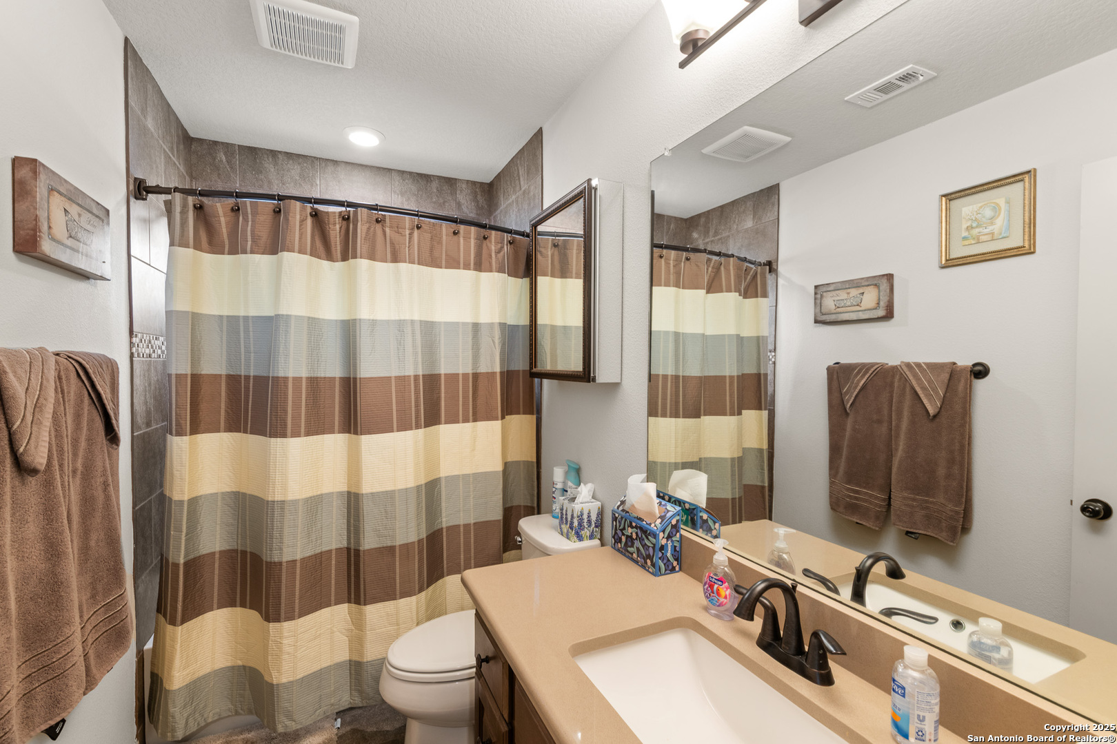 1446 Big Draw Drive Junction, TX 76849 - Photo 15 of 55 a bathroom with a sink toilet and shower