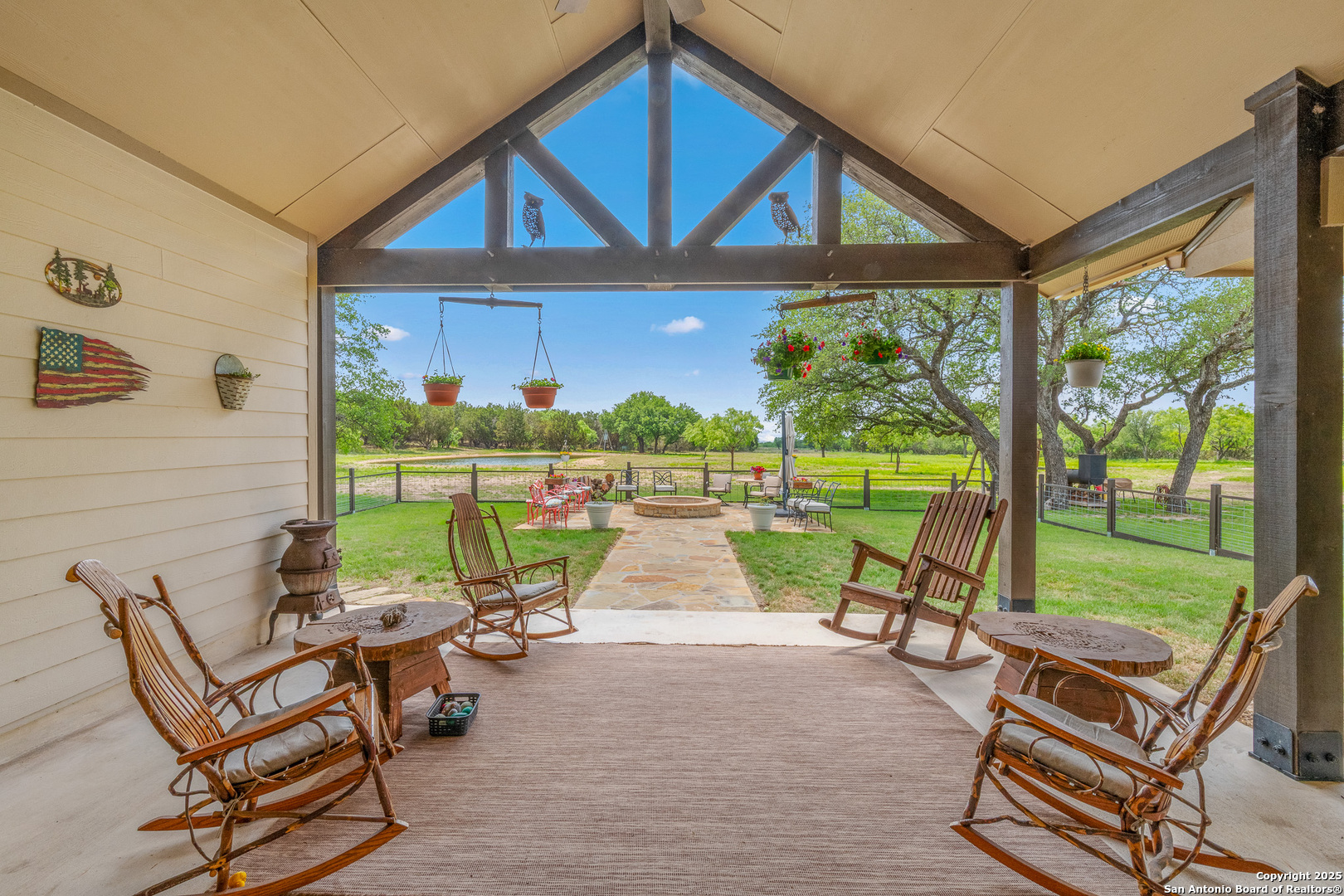 1446 Big Draw Drive Junction, TX 76849 - Photo 17 of 55 a view of chairs and table in backyard