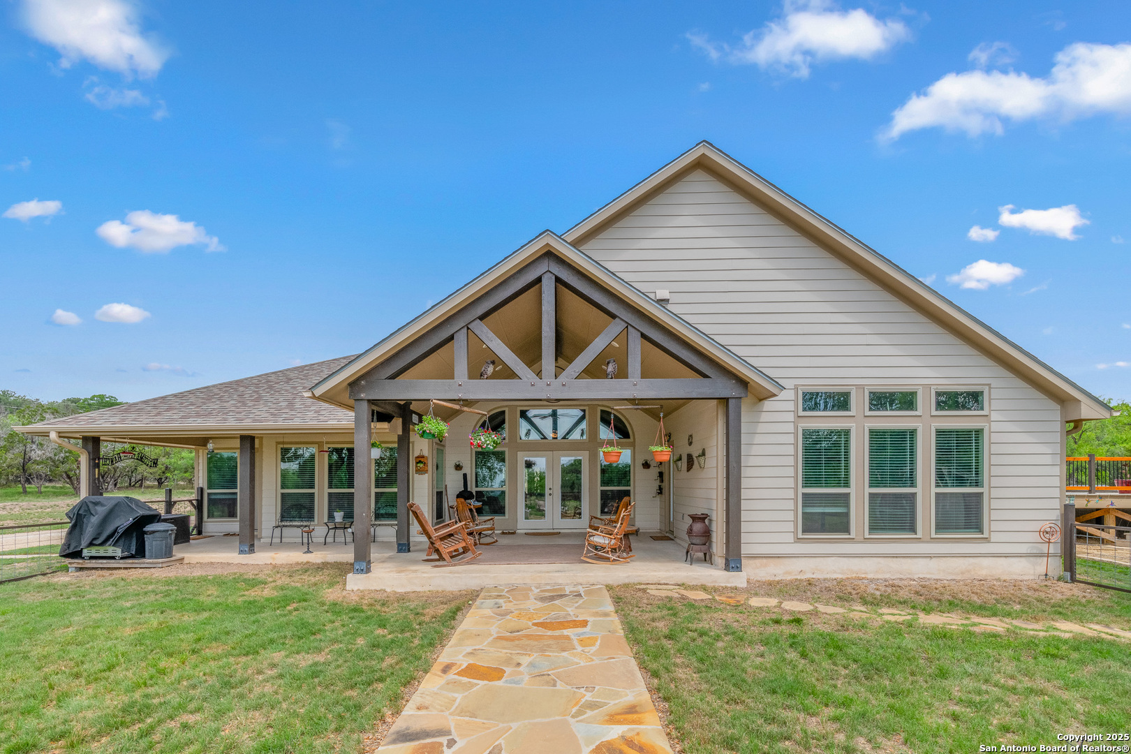 1446 Big Draw Drive Junction, TX 76849 - Photo 19 of 55 a view of a house with sitting area and garden