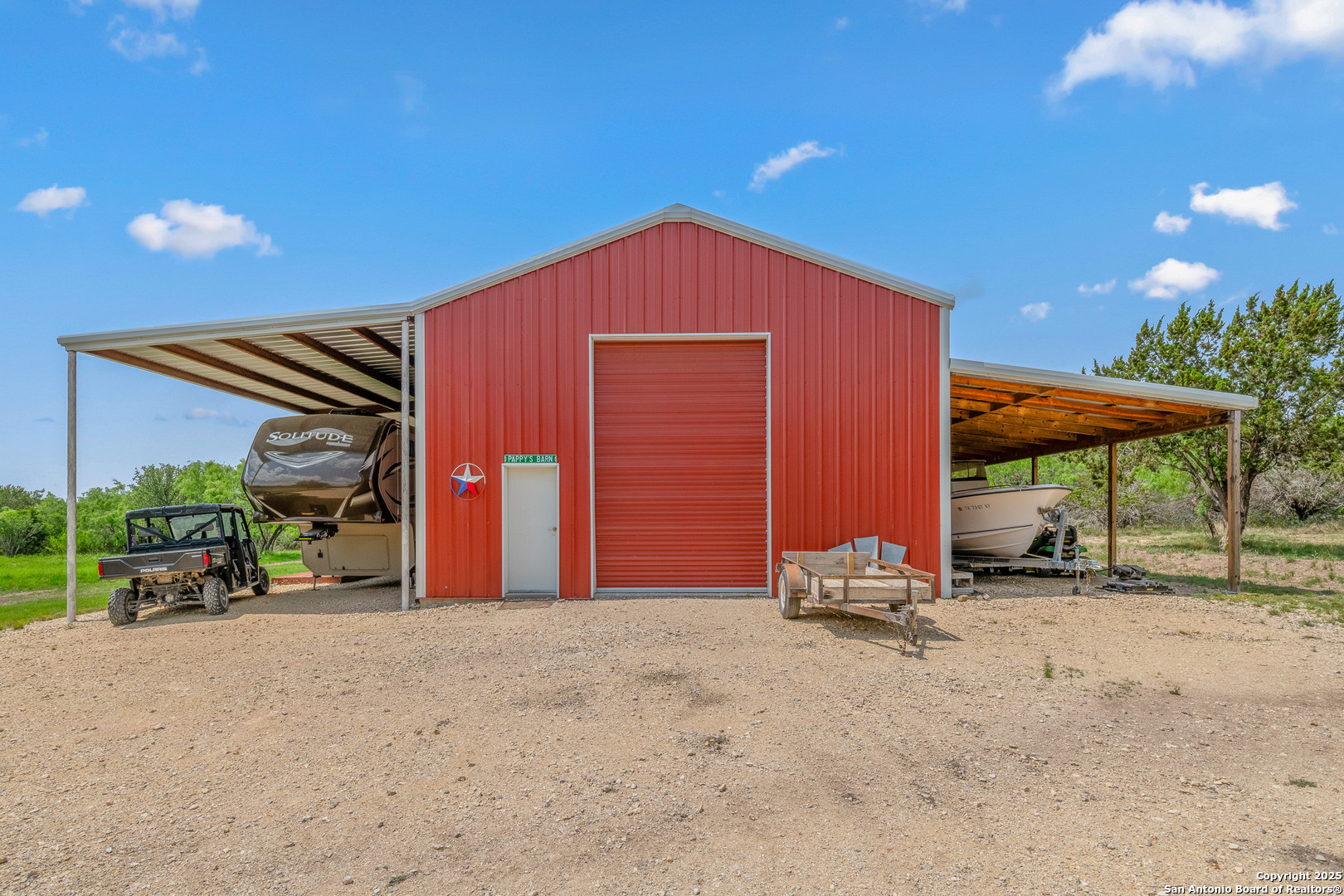 1446 Big Draw Drive Junction, TX 76849 - Photo 25 of 55 a backyard of a house