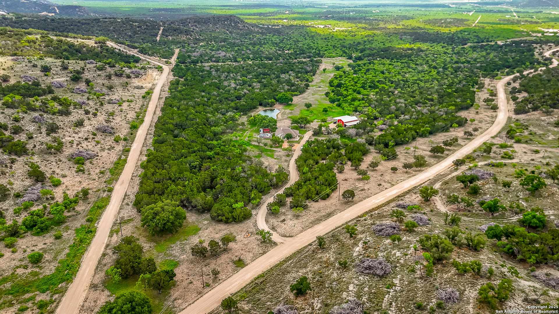 1446 Big Draw Drive Junction, TX 76849 - Photo 32 of 55 a view of a yard with plants