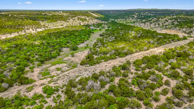 a view of a field with an outdoor space