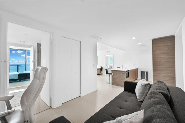 a kitchen with a sink cabinets and window